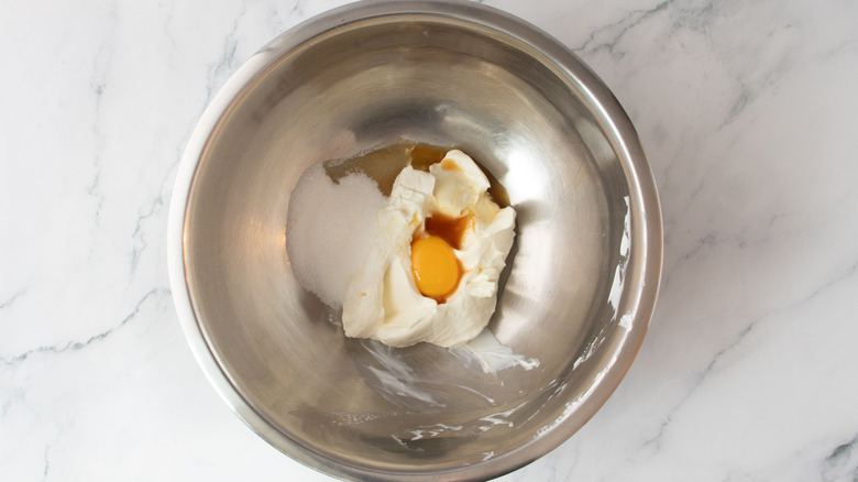 Cream cheese filling ingredients in bowl
