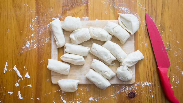 small dough pieces on board