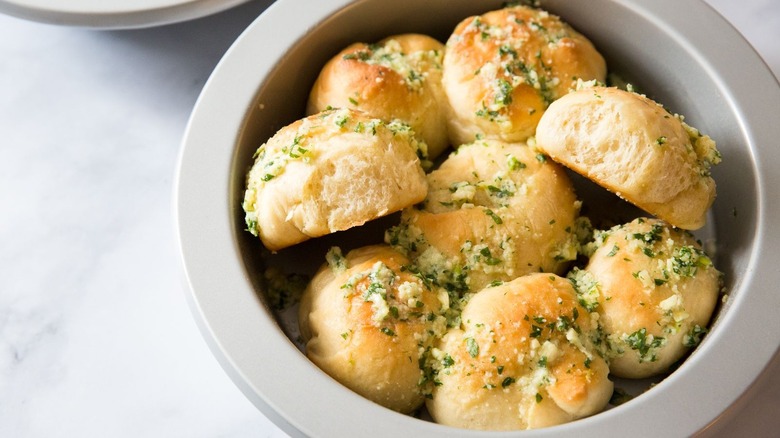 Parmesan garlic butter rolls in round dish