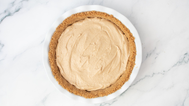 Peanut butter mousse layer in pie crust