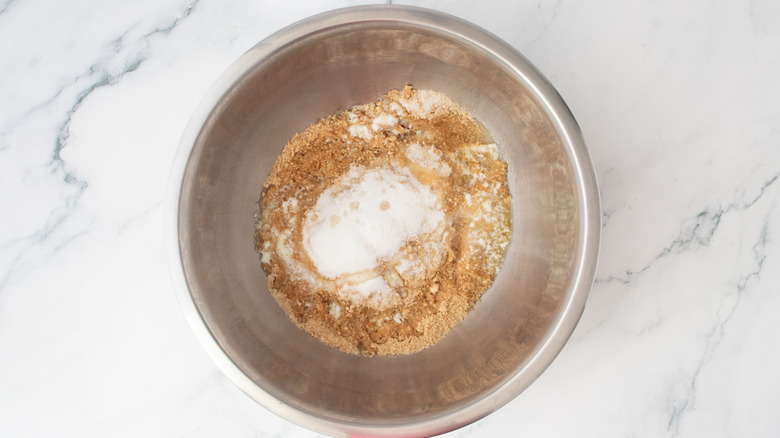 Graham cracker crust ingredients in bowl