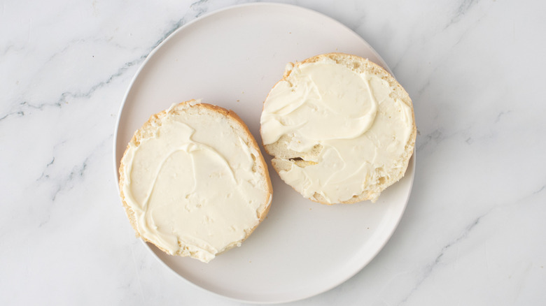 halved bun with mayo spread on both sides