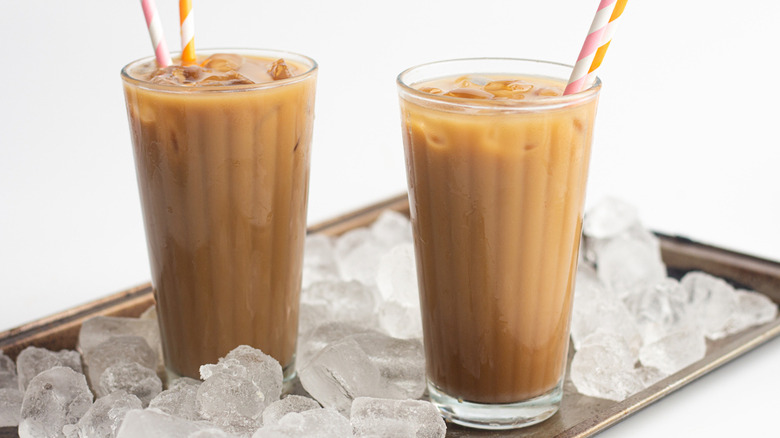 Iced coffee on tray with ice