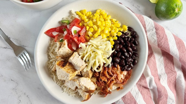 Chicken bacon ranch burrito bowl with various toppings