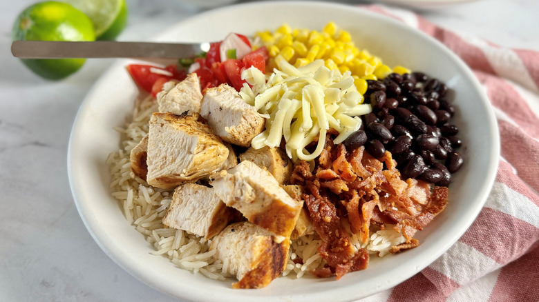 Chicken bacon ranch burrito bowl with various toppings