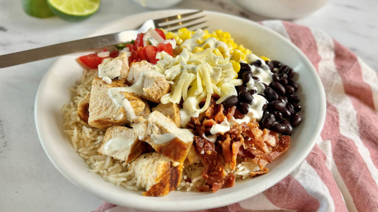 Chicken burrito bowl with various toppings