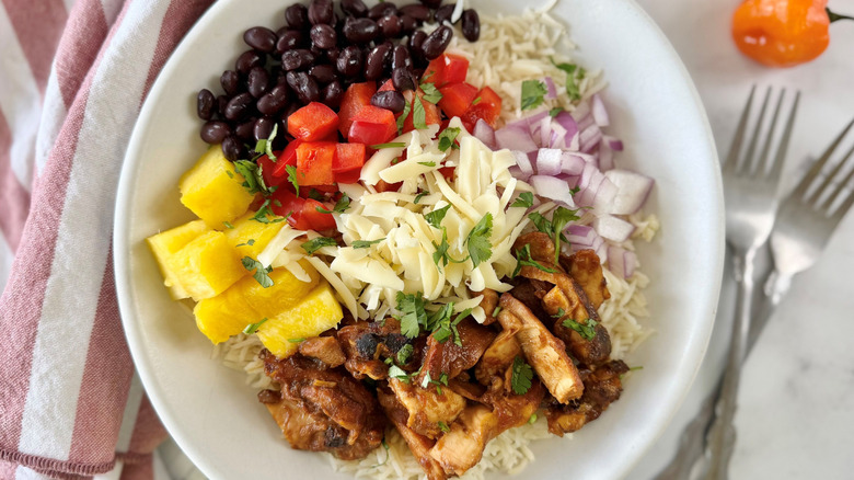Hawaiian burrito bowl with various toppings