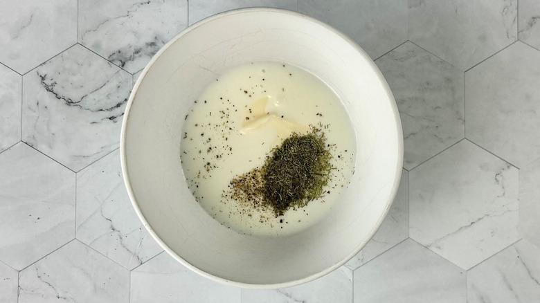 Ranch dressing ingredients unmixed in bowl