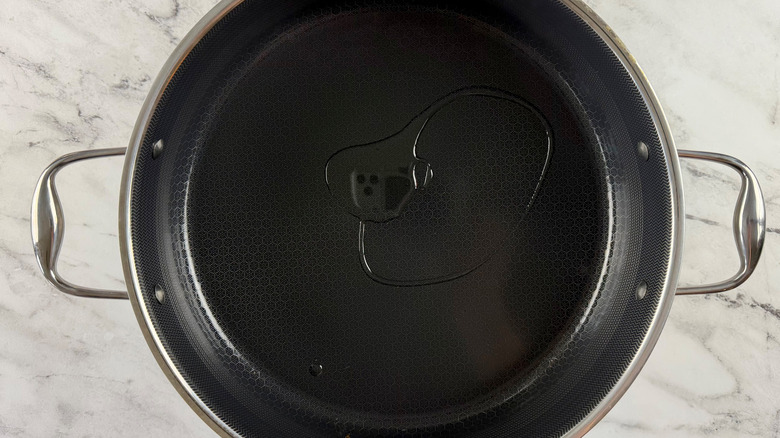 oil in a black frying pan