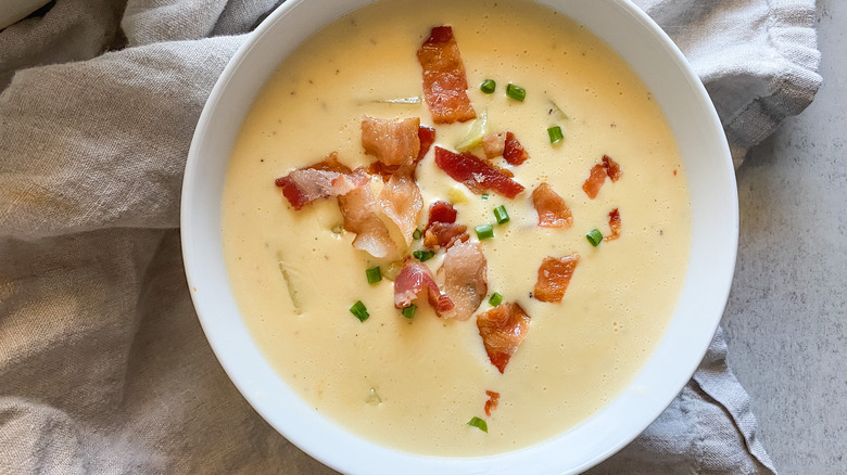  bowl of copycat O'Charley's Loaded Potato Soup with bacon on top