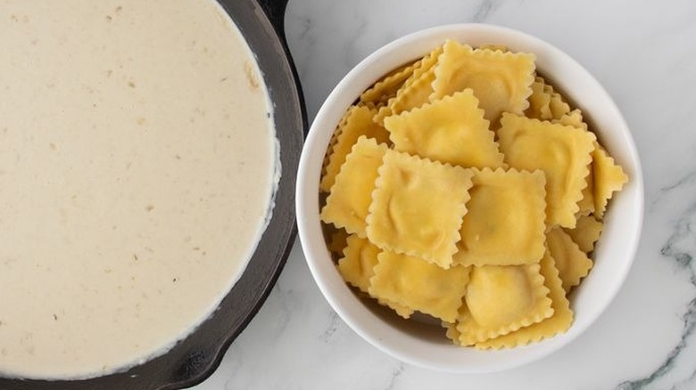 Cream sauce and ravioli