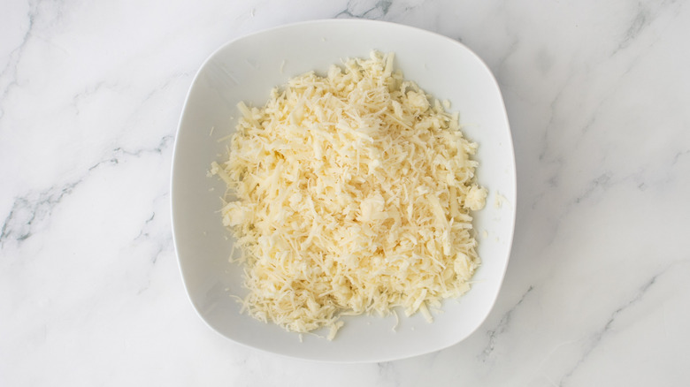 shredded cheese in a white bowl