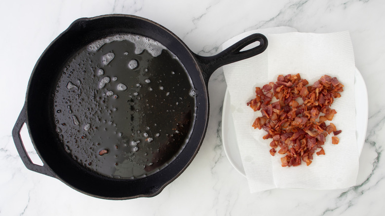 chopped cooked bacon on a paper towel