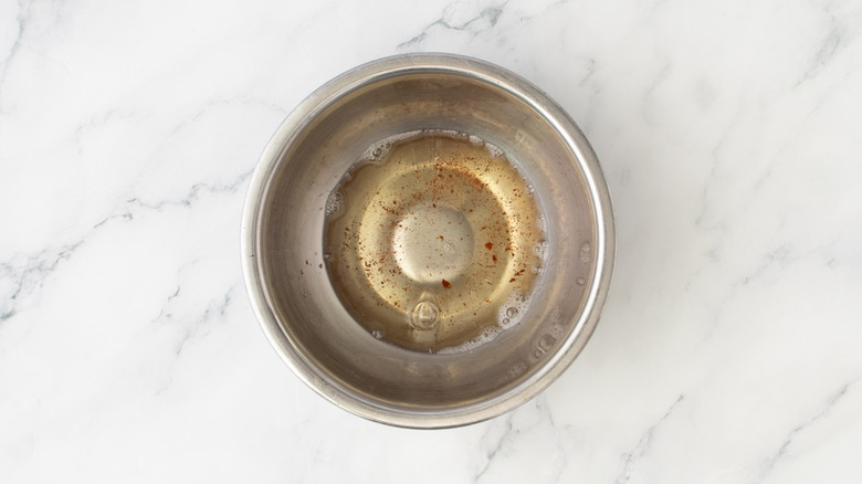 bacon grease in a metal bowl