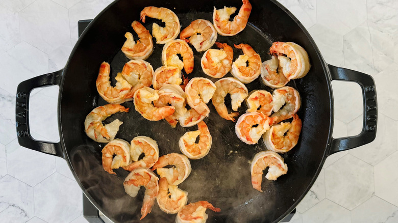 Aerial view of cooked shrimp in large pan