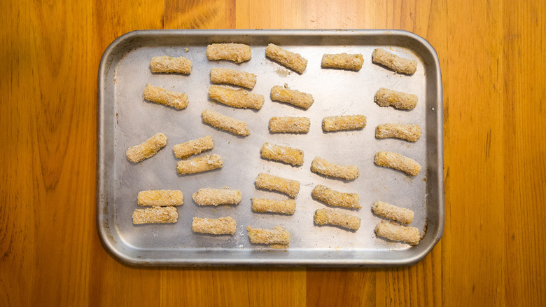 breaded rigatoni on baking sheet