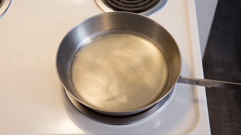oil heating in frying pan