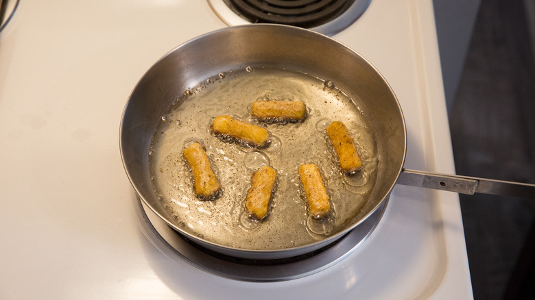 breaded pasta frying in oil