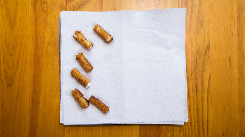 breaded pasta draining on paper towels