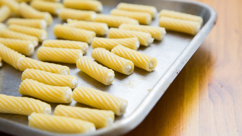 stuffed pasta on baking sheet