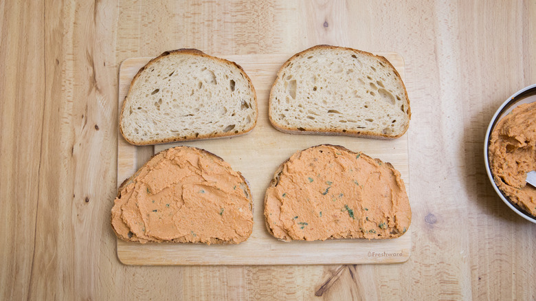 bread and hummus on table