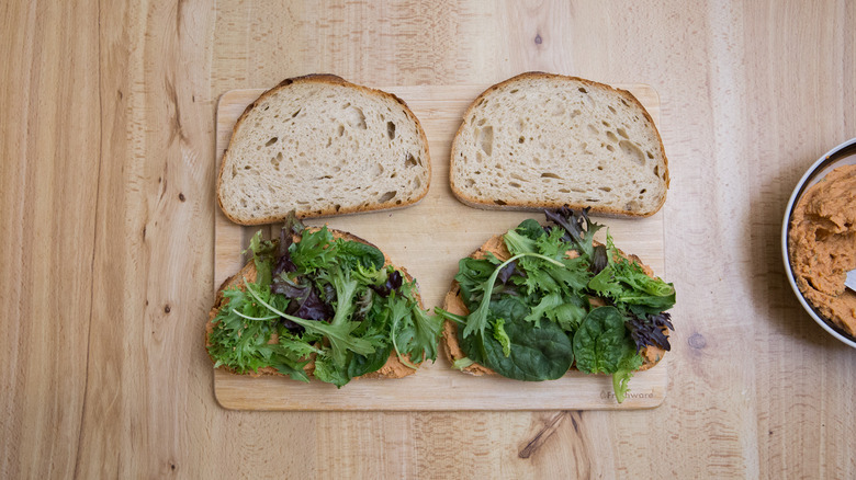 partially made sandwiches on table