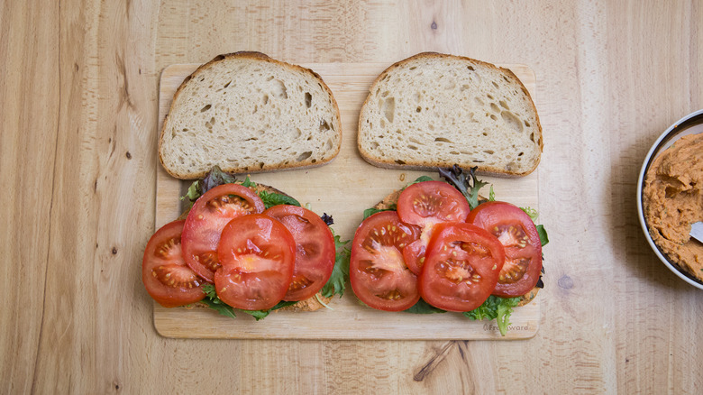 partially made sandwiches on table