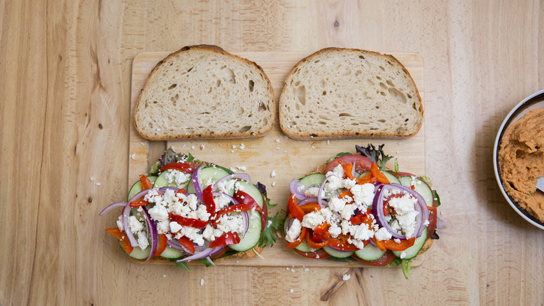 partially made sandwiches on table