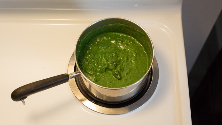 creamed spinach in small saucepan