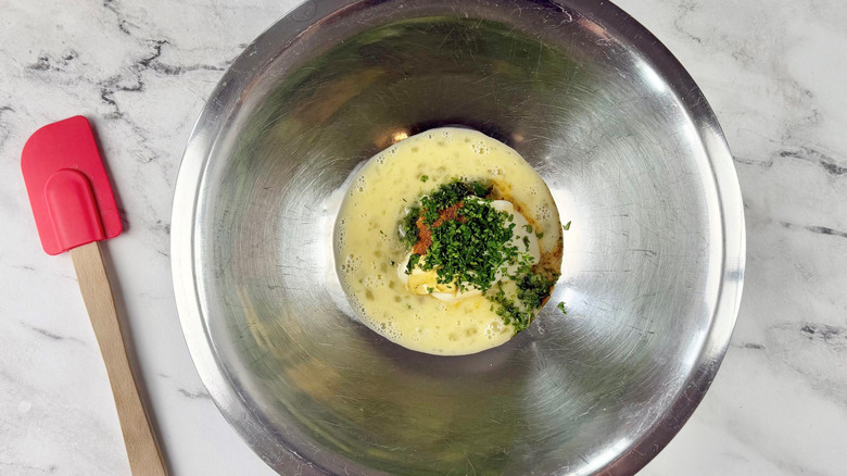 Various sauces and herbs in bowl