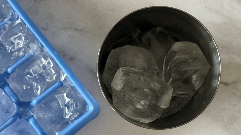 ice cubes in a metal tumbler