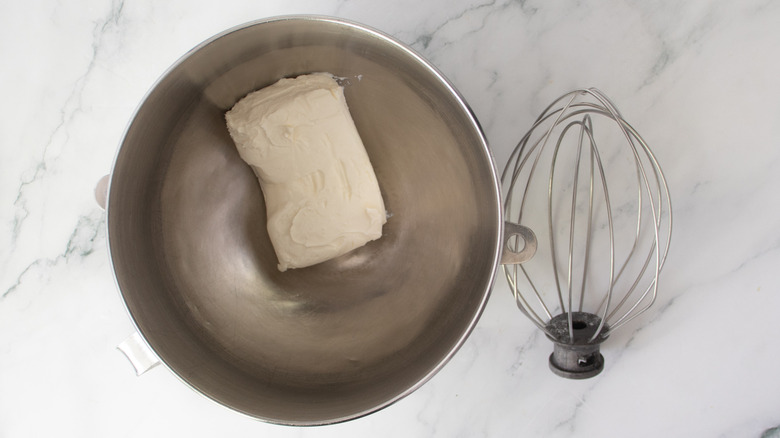 cream cheese in a metal bowl