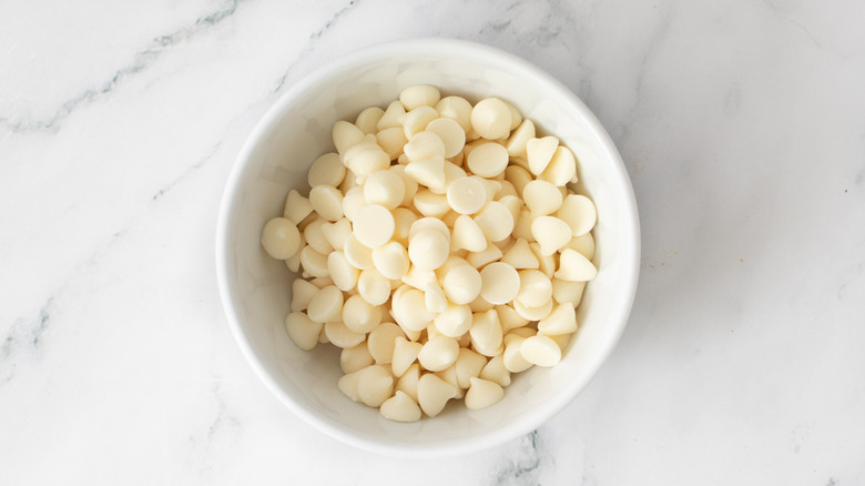 white chocolate chips in a white bowl