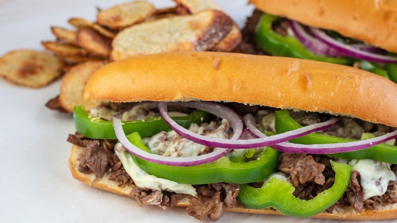 Steak and cheese sub with peppers and onions