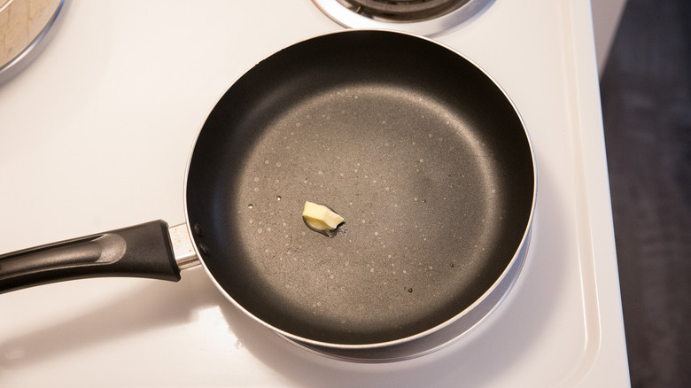 butter melting in nonstick pan