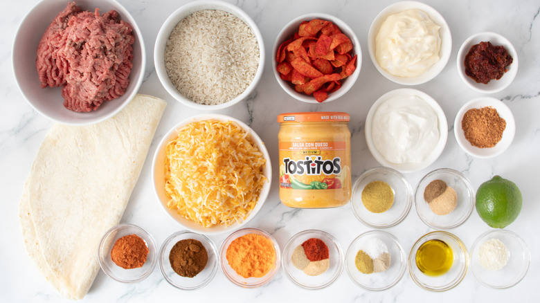 Taco Bell Flamin' Hot grilled cheese burrito ingredients on countertop