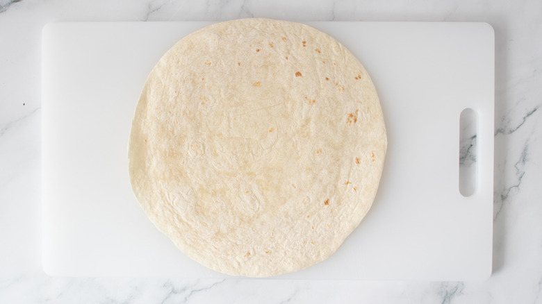 flour tortilla on a white board