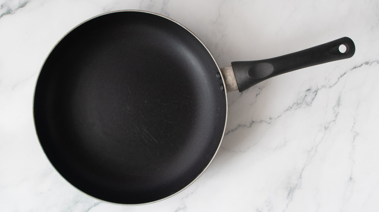 black frying pan on a kitchen counter