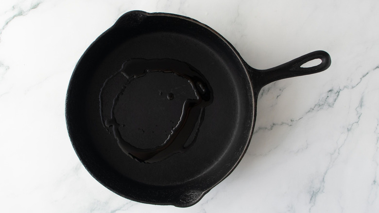 Drizzle of oil in skillet