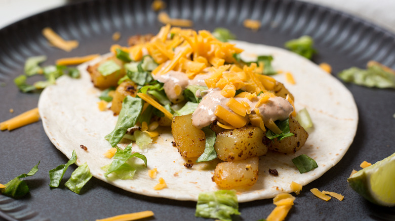 potato taco served on plate
