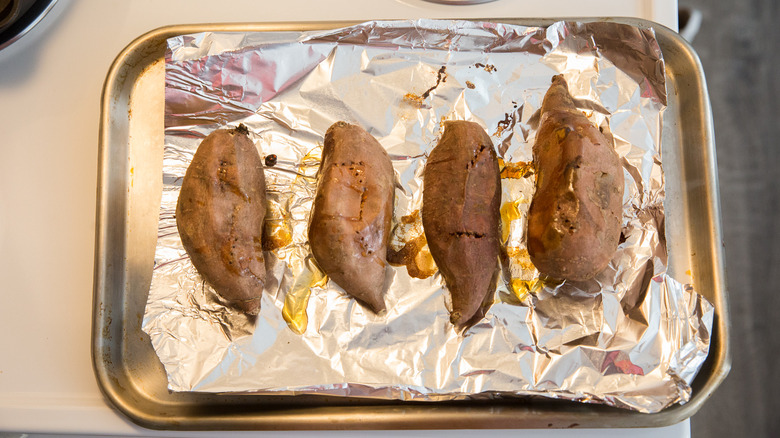baked sweet potatoes on pan
