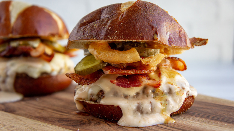 a pretzel bun cheeseburger