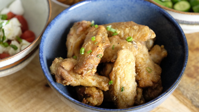 Copycat Wingstop lemon pepper wings in bowl 