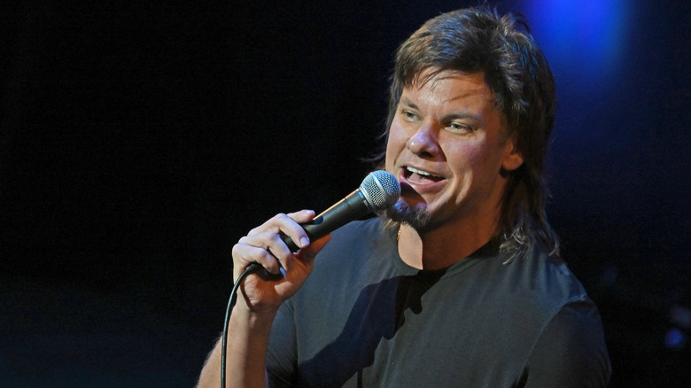Theo Von speaking into microphone