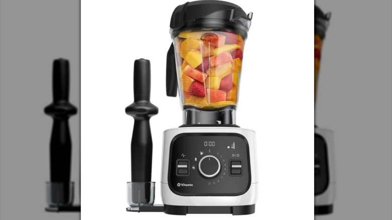 High-tech blender with fruit inside
