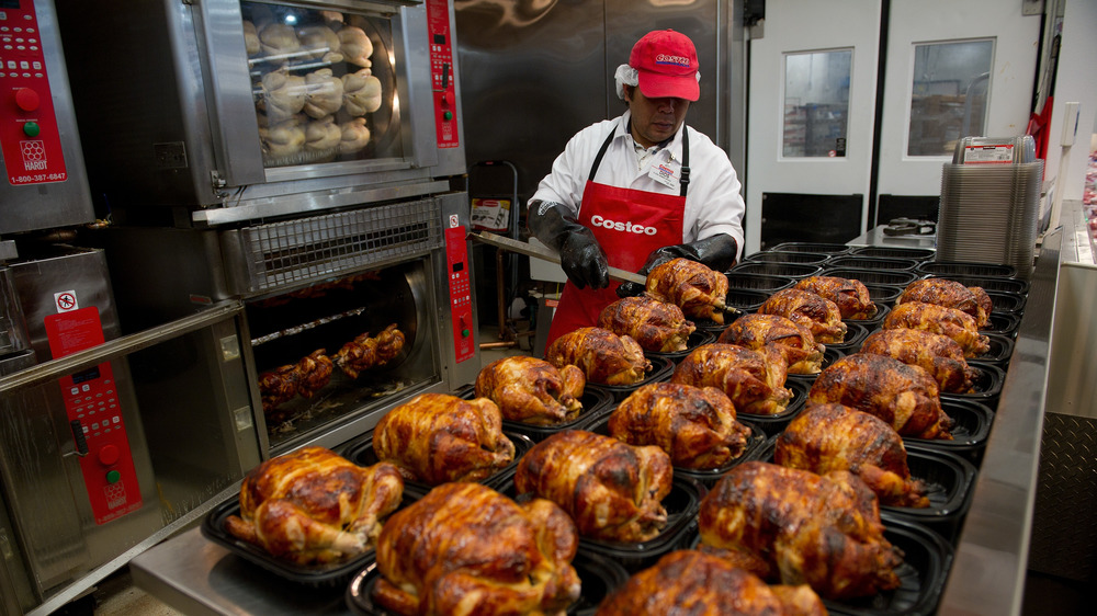 Costco rotisserie chickens being packaged