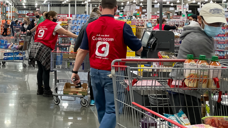 People checking out at Costco