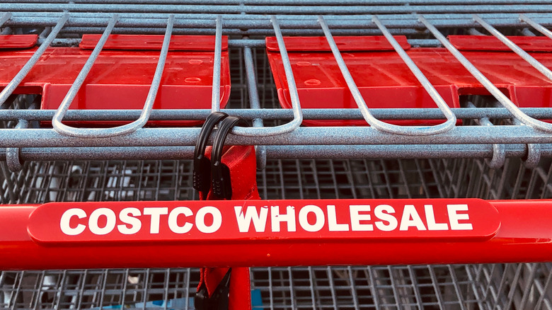 "Costco wholesale" text on shopping cart handle