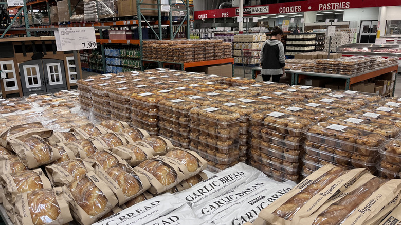 Tables lined with boxes of pastries at Costco