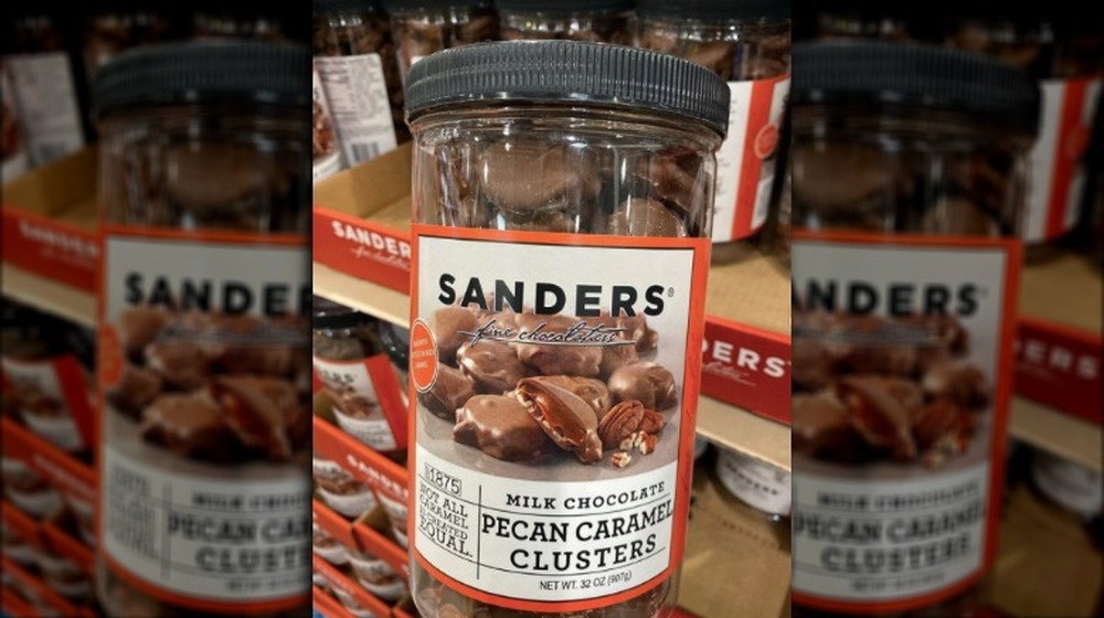 container of milk chocolate caramel pecan clusters